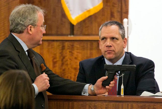 Prosecutor Patrick Bomberg, left, questions Kyle Aspinwall, an employee of weapons manufacturer Glock, during Aaron Hernandez's murder trial at Bristol County Superior Court in Fall River on Wednesday.
