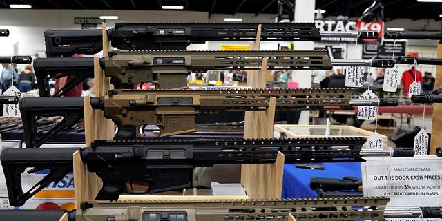 AR-15 rifles are displayed for sale at the Guntoberfest gun show in Oaks, Pennsylvania, Oct.  6, 2017.